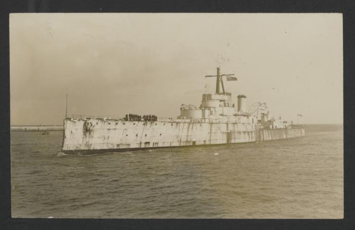 British surface warship lacking visible armament entering Grand Harbour, Malta