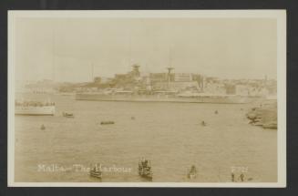 (Queen Elizabeth-class?) battleship in Grand Harbour, Malta, with Bighi Naval Hospital in the background