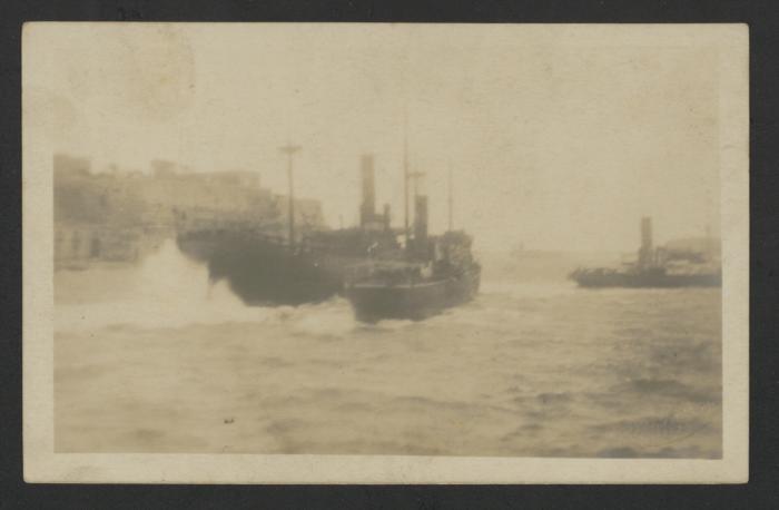 Unidentified seacraft in Grand Harbour, Malta, in adverse weather conditions