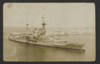 (Queen Elizabeth-class?) battleship entering Grand Harbour, Malta, with Fort Ricasoli in the background