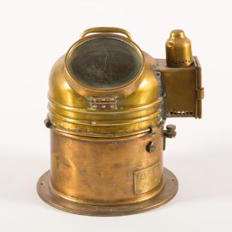 Compass in brass binnacle